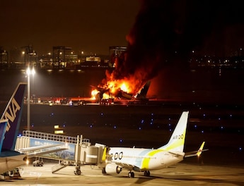 Japan Airlines plane in flames at Tokyo's Haneda Airport; Airbus sends team  to probe collision